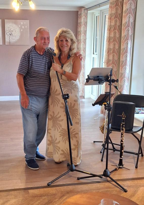 Resident Eric joined singer Sarah to entertain residents and staff at Fairmile