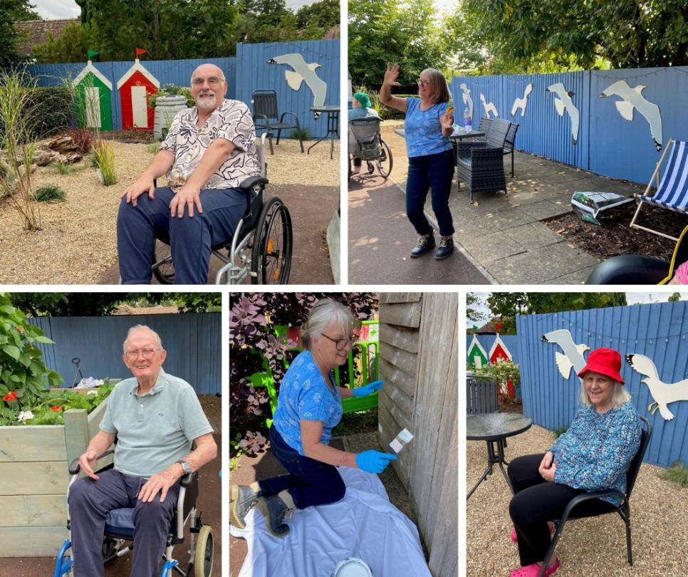 residents and staff enjoying the new beach garden