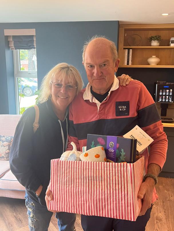 Sue and Brett with their winning prize