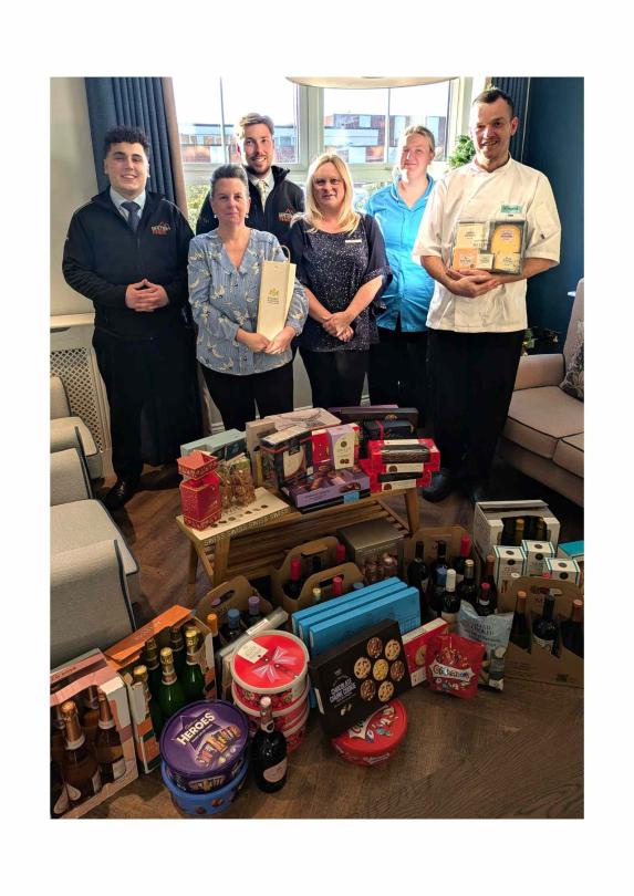 Focal Point Fires with senior team members and their wonderful gift to the residents