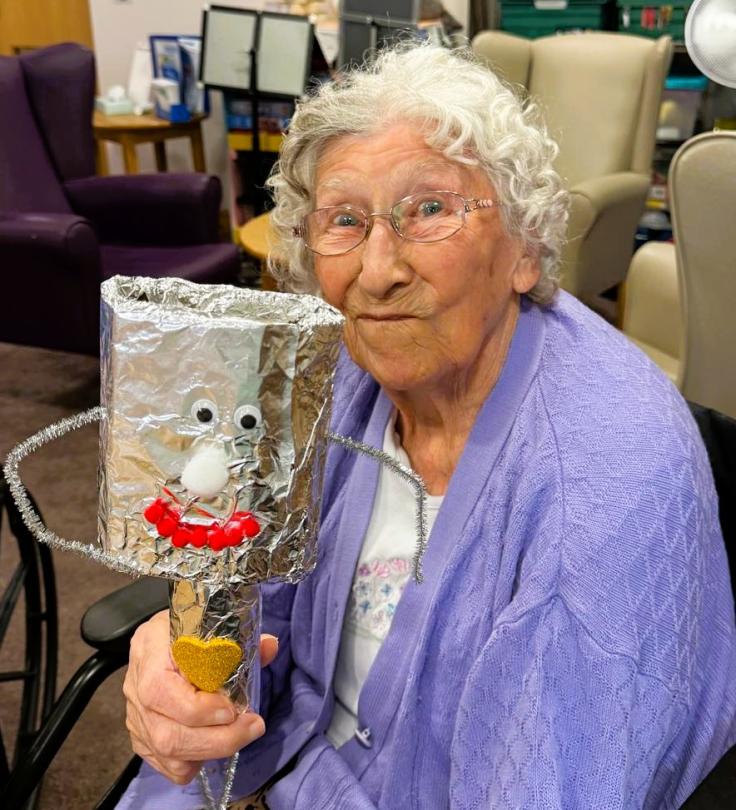 Cherry Blossom resident with her Tin Man