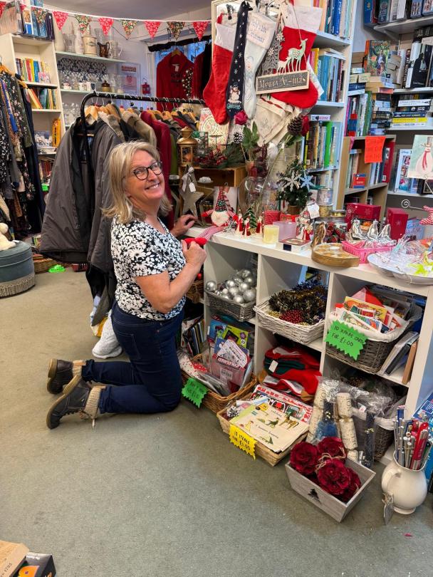 Wendy helping at a local charity shop