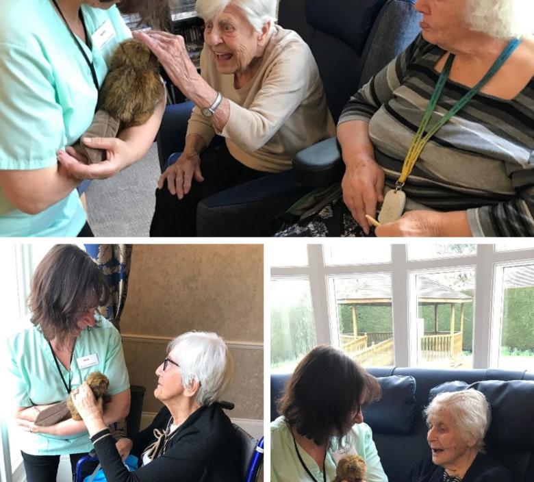 residents enjoying Sandy's beaver puppet