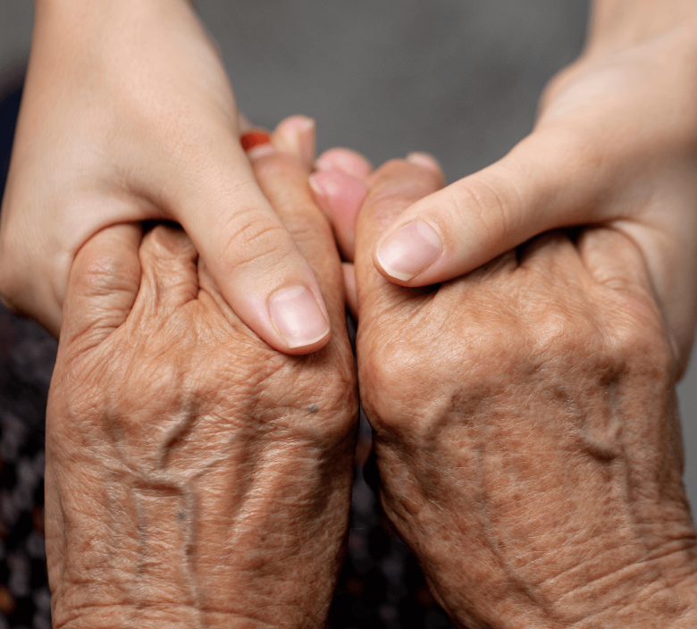 nurse looking after end of life care resident