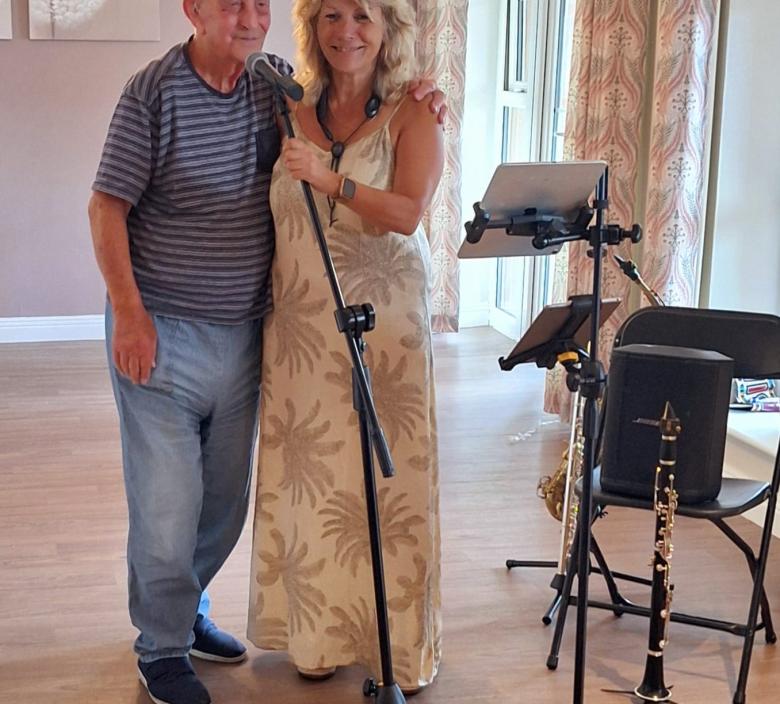 Resident Eric joined singer Sarah to entertain residents and staff at Fairmile