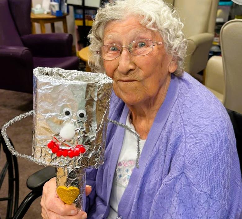 Cherry Blossom resident with her Tin Man