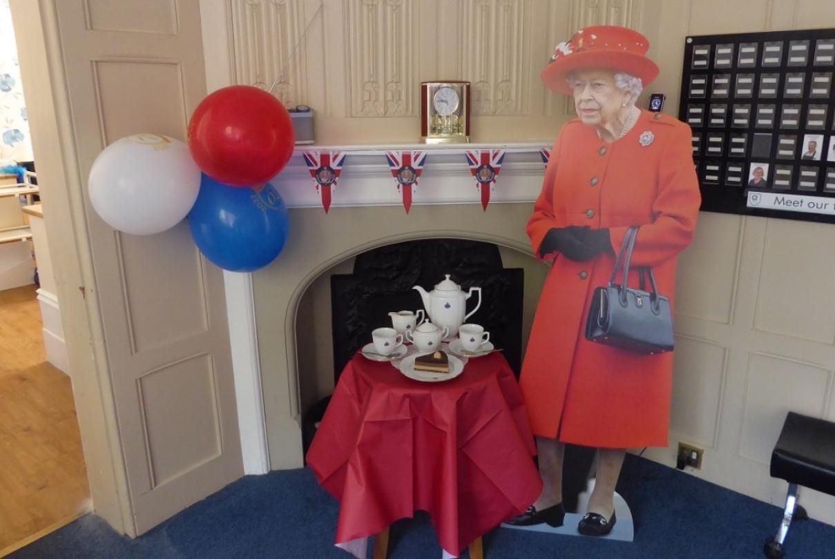 Cardboard cutout of the Queen in a Nursing Home for Jubilee celebrations