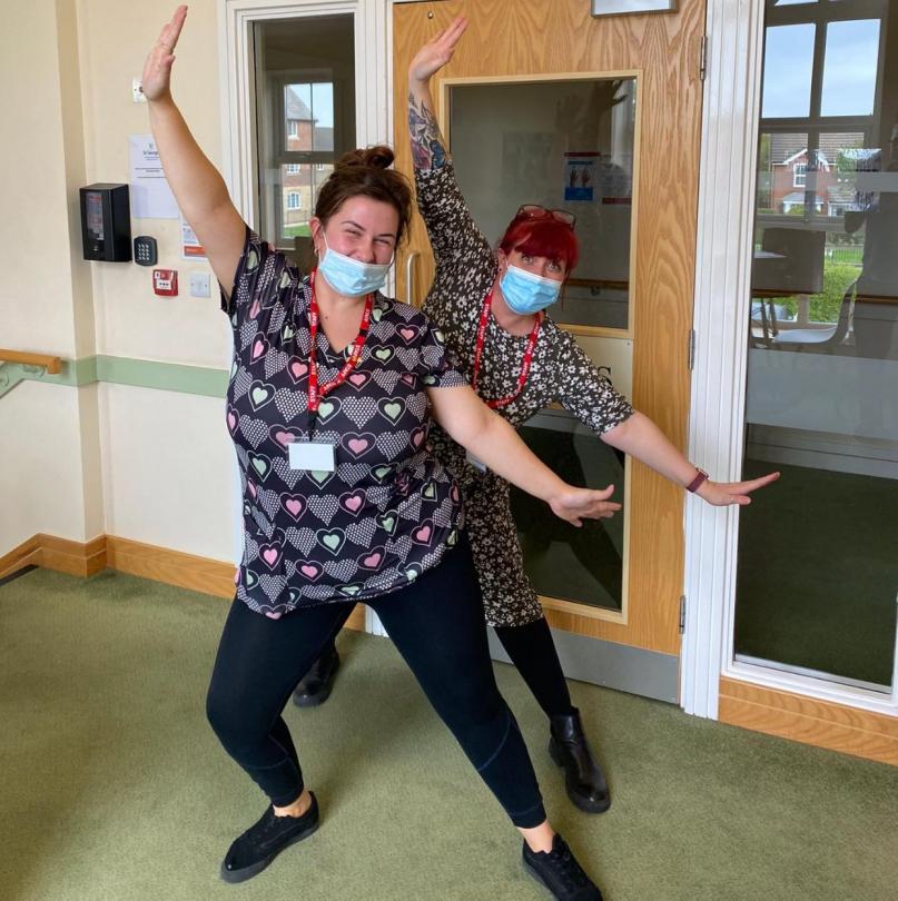 St Georges Nursing Home care staff dancing with masks on 