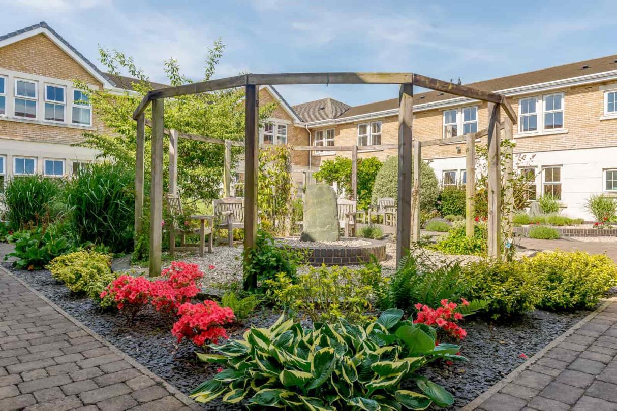 image of courtyard at St Georges Nursing Home on a sunny day