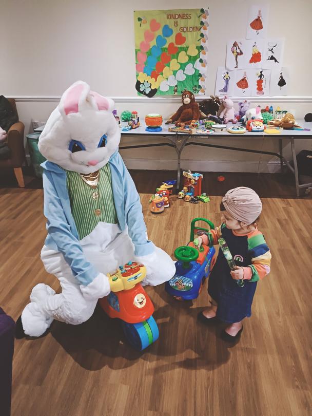 Kids at Magdalen Home being visited by the Easter Bunny