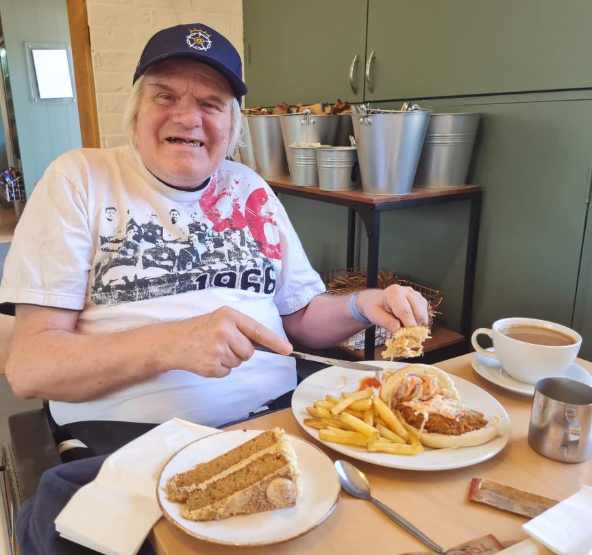 Our resident Keith enjoying a big slice of yummy cake.