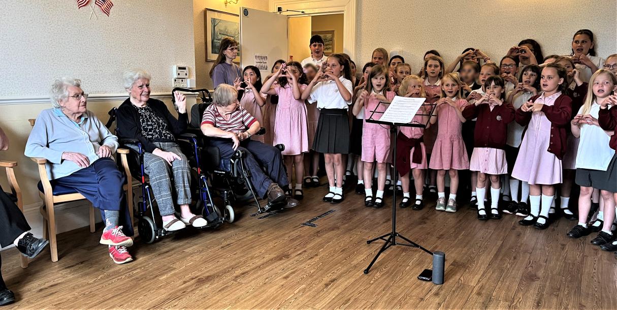Halterworth School Choir singing to Cedar Lawn residents