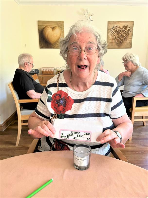 Mavis winning at Bingo