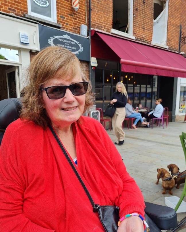 Julie enjoying Romsey before the rain