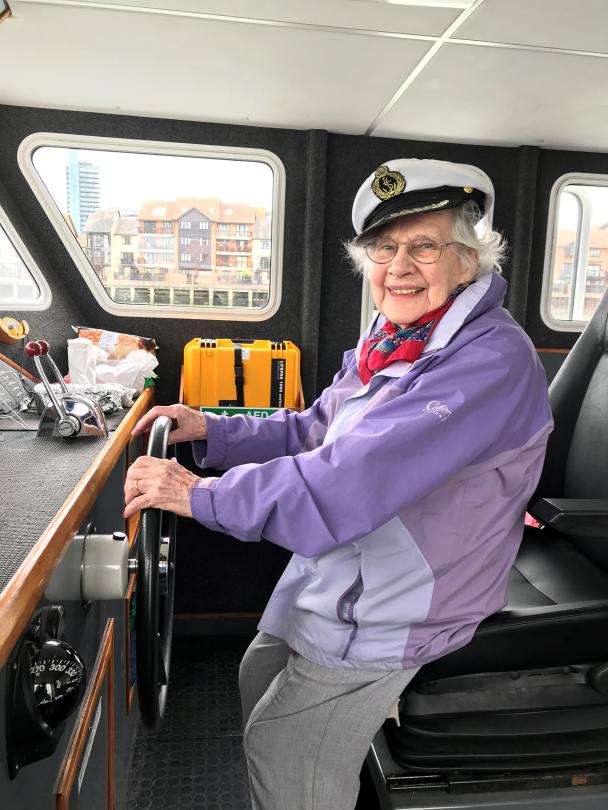 Thelma steers the boat
