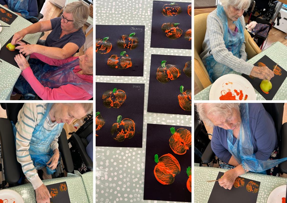 Residents creating Apple Pumpkin Prints at Cedar Lawn