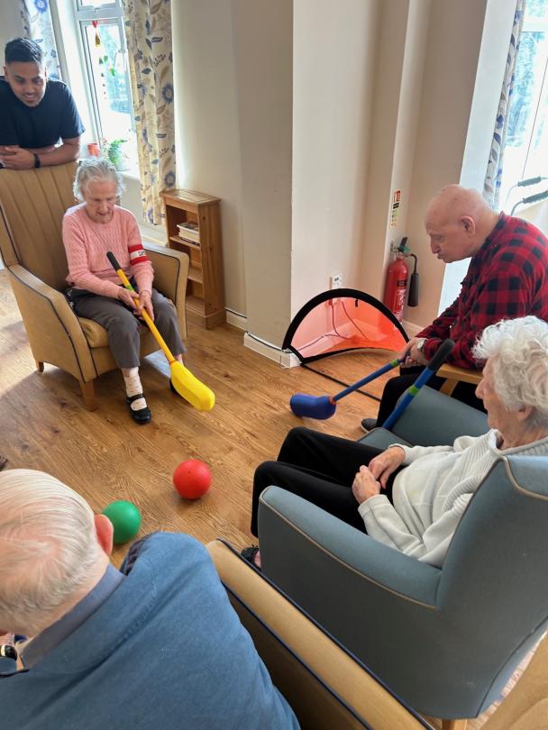 Residents at Dunwood Manor enjoying chair games