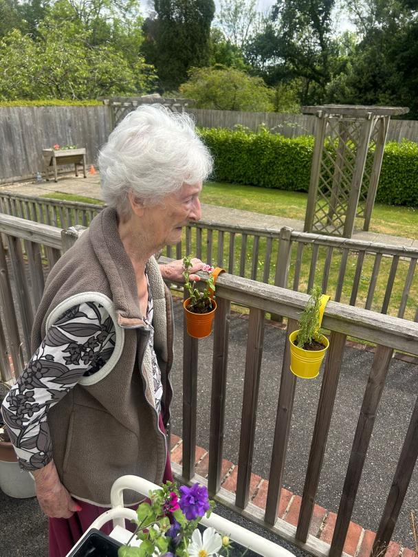 Shirley doing a spot of gardening