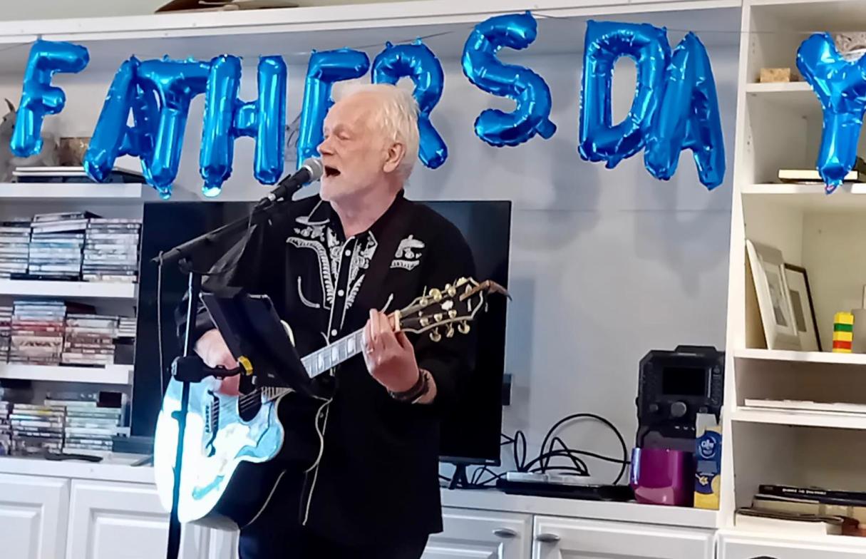 Phil Cowan performing for Fairmile Grange residents