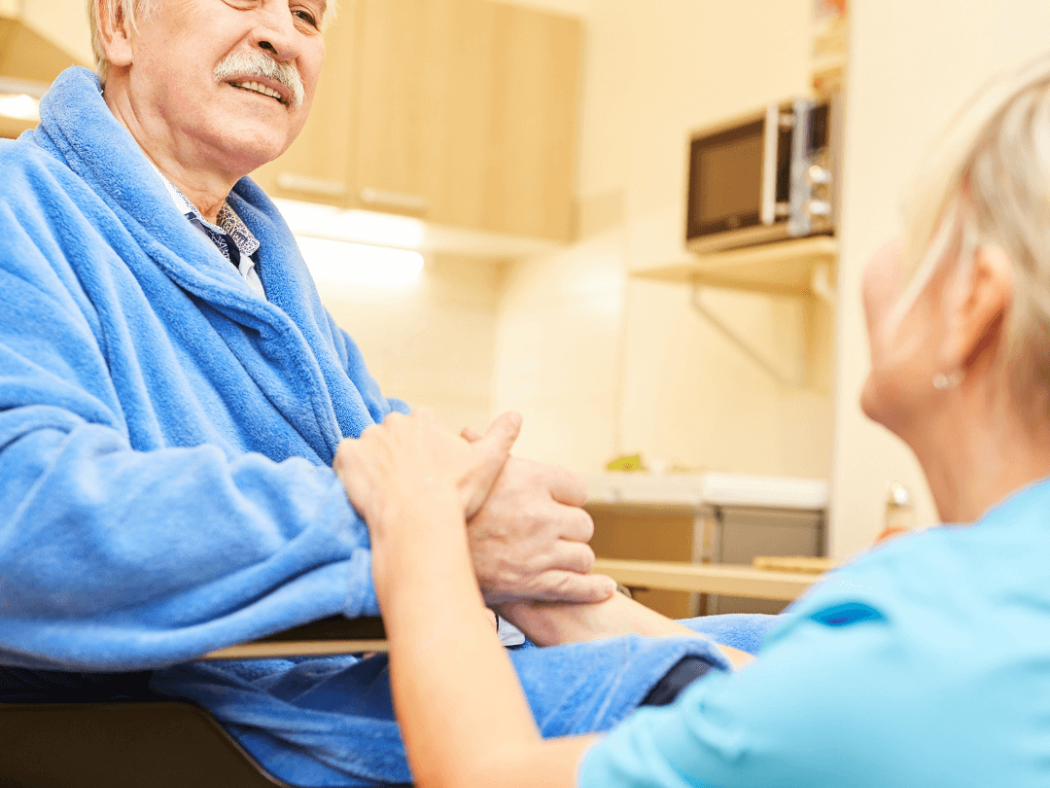 Nurse caring for resident with dementia