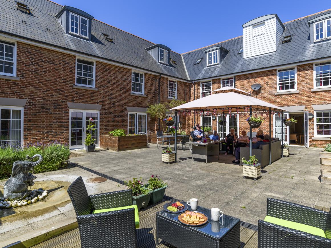 residents sat outside care home
