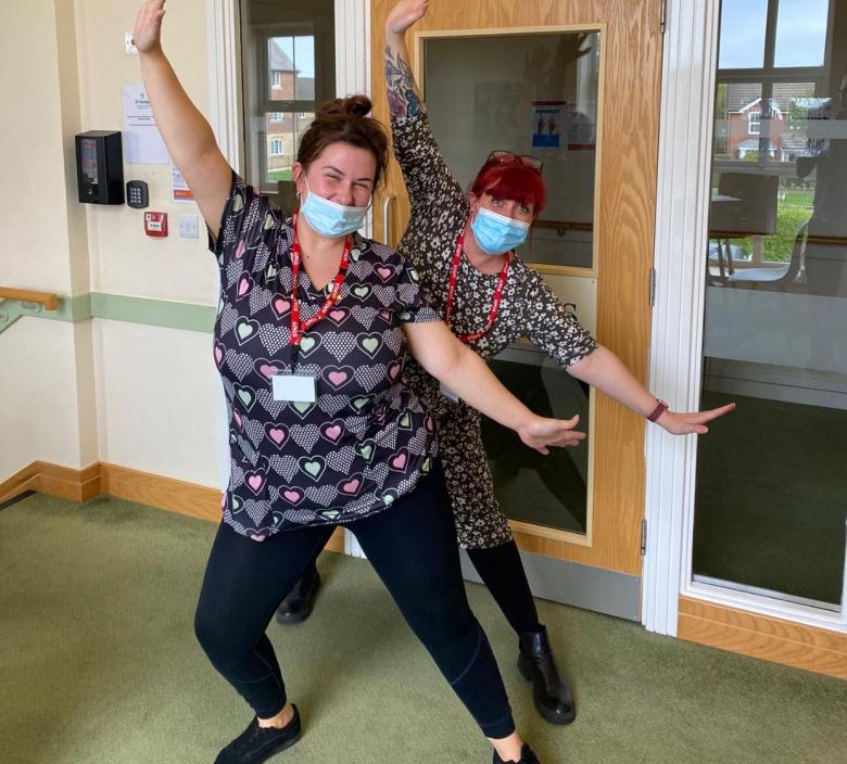St Georges Nursing Home care staff dancing with masks on 
