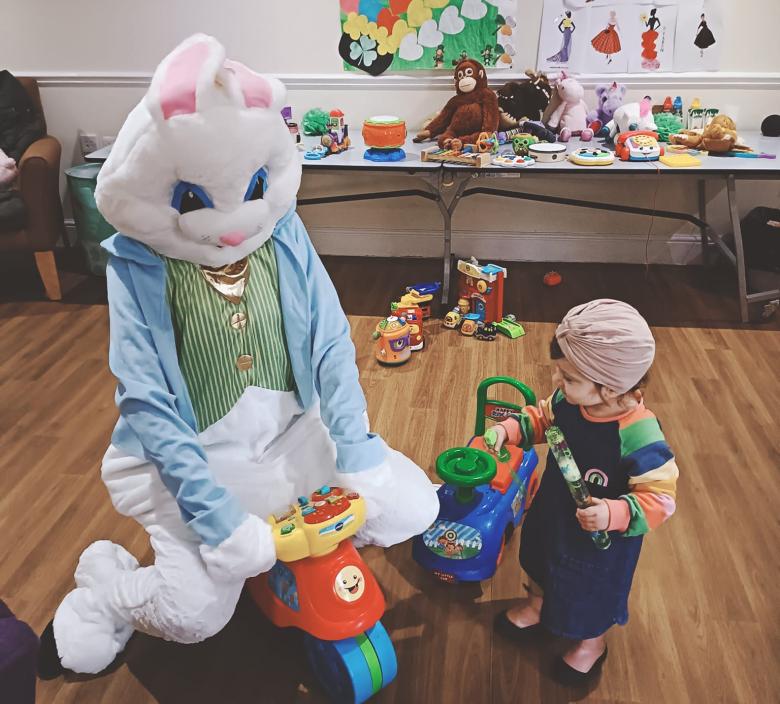 Kids at Magdalen Home being visited by the Easter Bunny