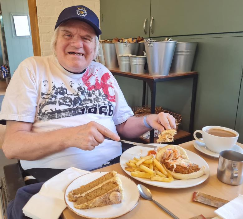 Our resident Keith enjoying a big slice of yummy cake.