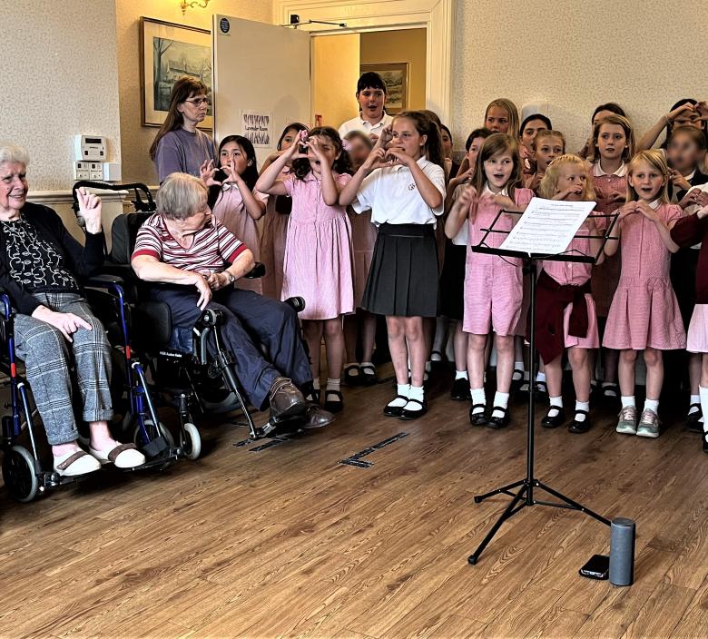 Halterworth School Choir singing to Cedar Lawn residents