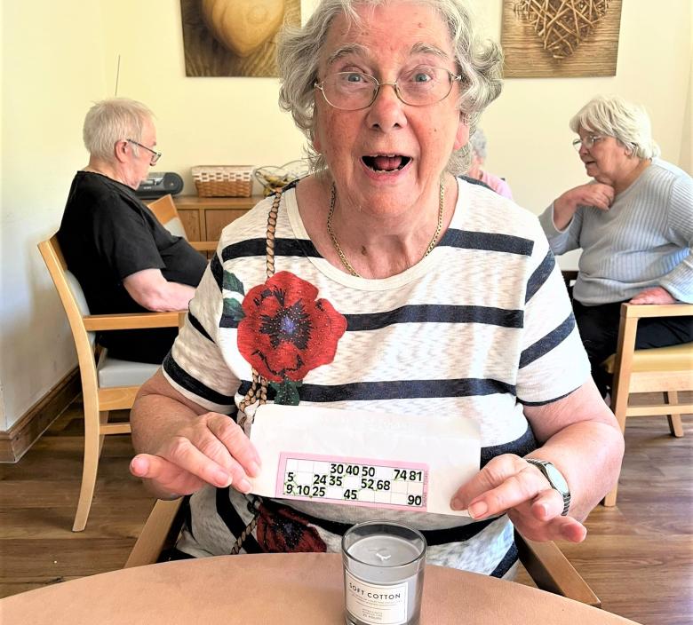 Mavis winning at Bingo