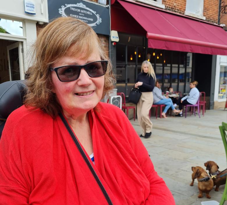 Julie enjoying Romsey before the rain