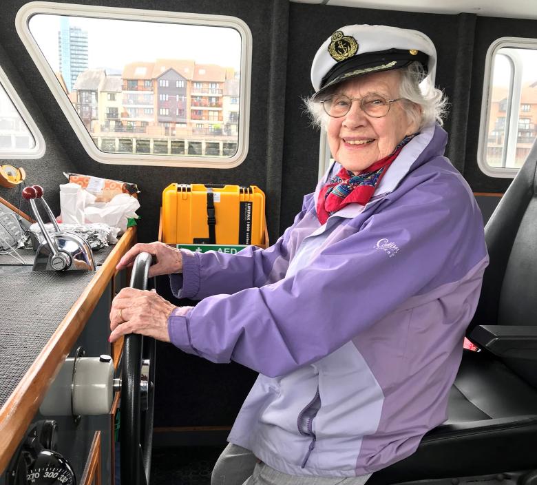 Thelma steers the boat