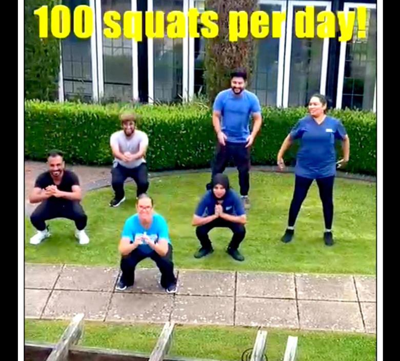 Aga and her colleagues doing their daily squats