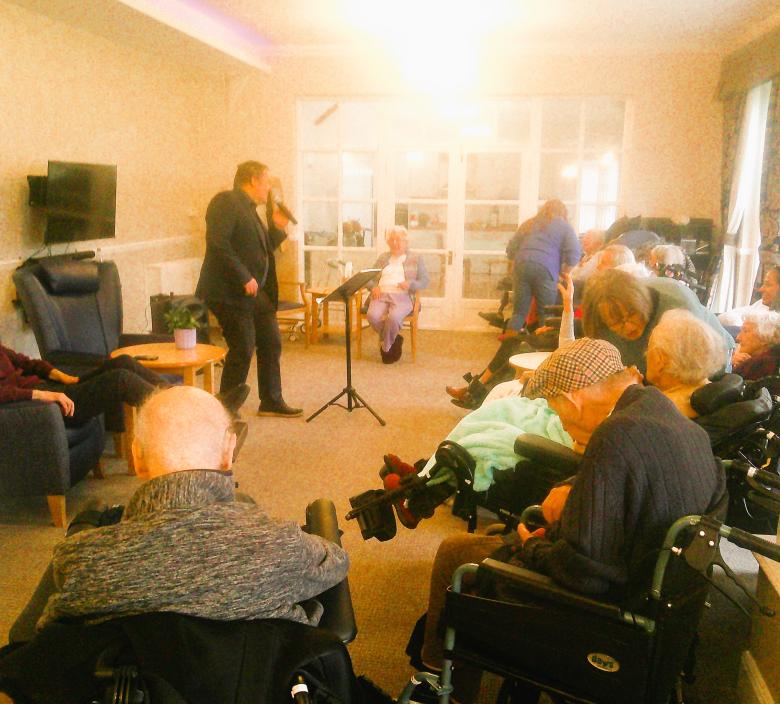 Mark Bourne entertaining Cedar Lawn residents