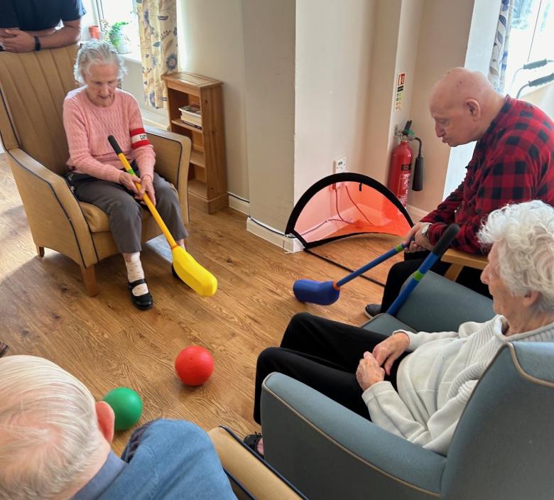 Residents at Dunwood Manor enjoying chair games