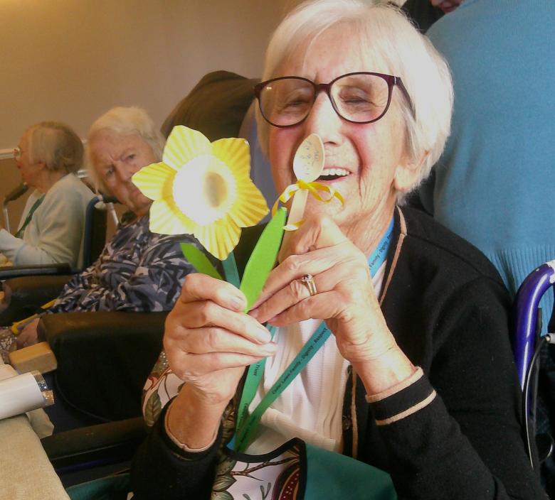 One of Cedar Lawn residents with her creative masterpiece