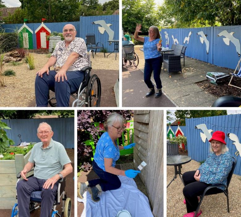 residents and staff enjoying the new beach garden