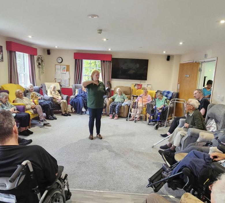 Residents at Magdalen House enjoy a visit from Lavenham Falconry birds of prey