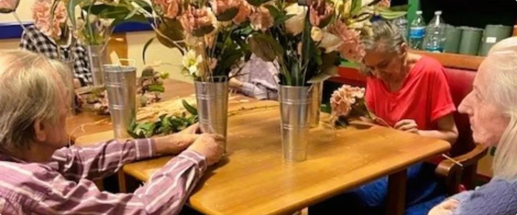 Flower Arranging Fun in Our New Activity Room!