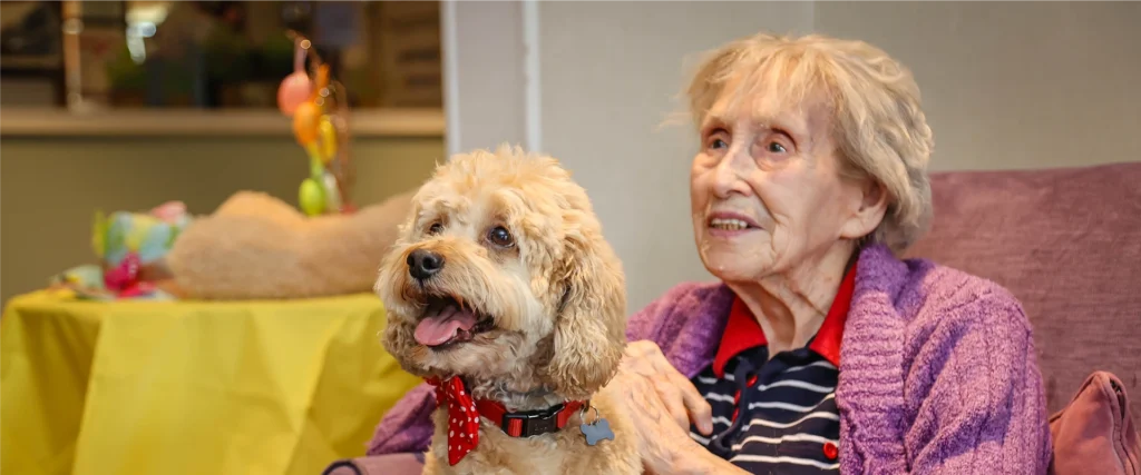 Allegra Resident Enjoying With Pet
